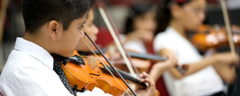 From Stage Fright to Standing Ovation: How Music Lessons Build Confidence and Self-Expression